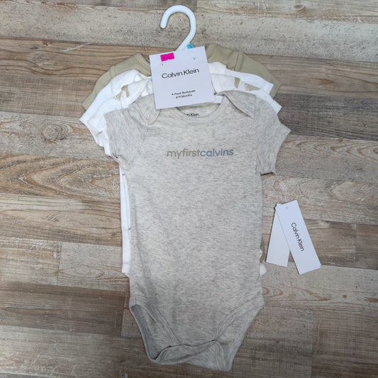 Set 4 bodysuit Calvin Klein talla 6/9 meses