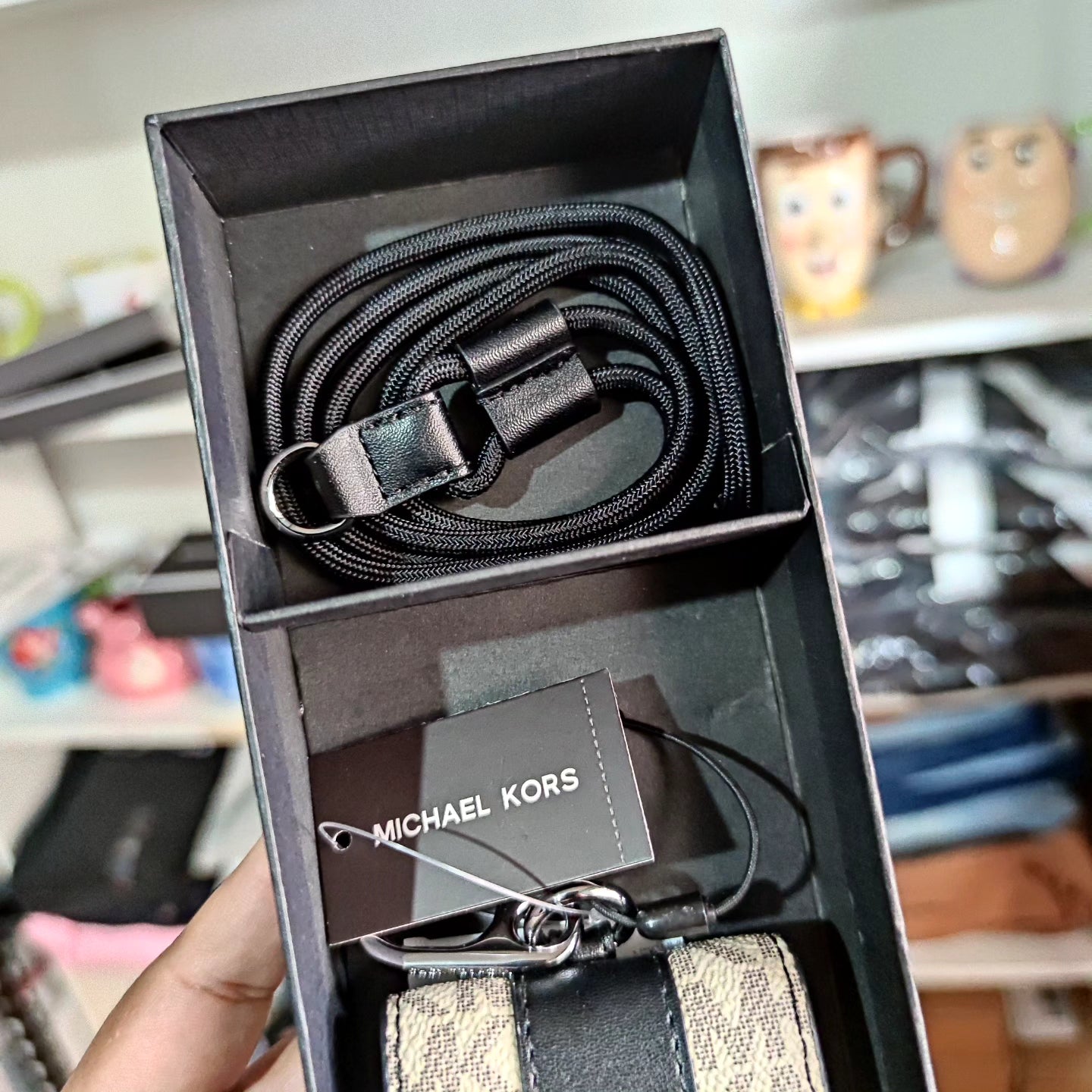 Porta airpod Michael kors